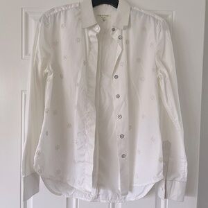 Leather detail on shirt and cuff. Great condition.